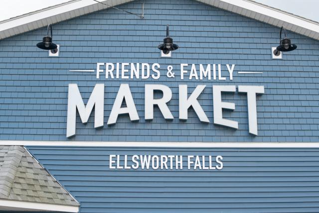 The Friends & Family Market sign on the storefront in Ellsworth Falls